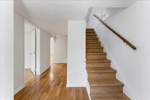 a view of entryway with wooden floor