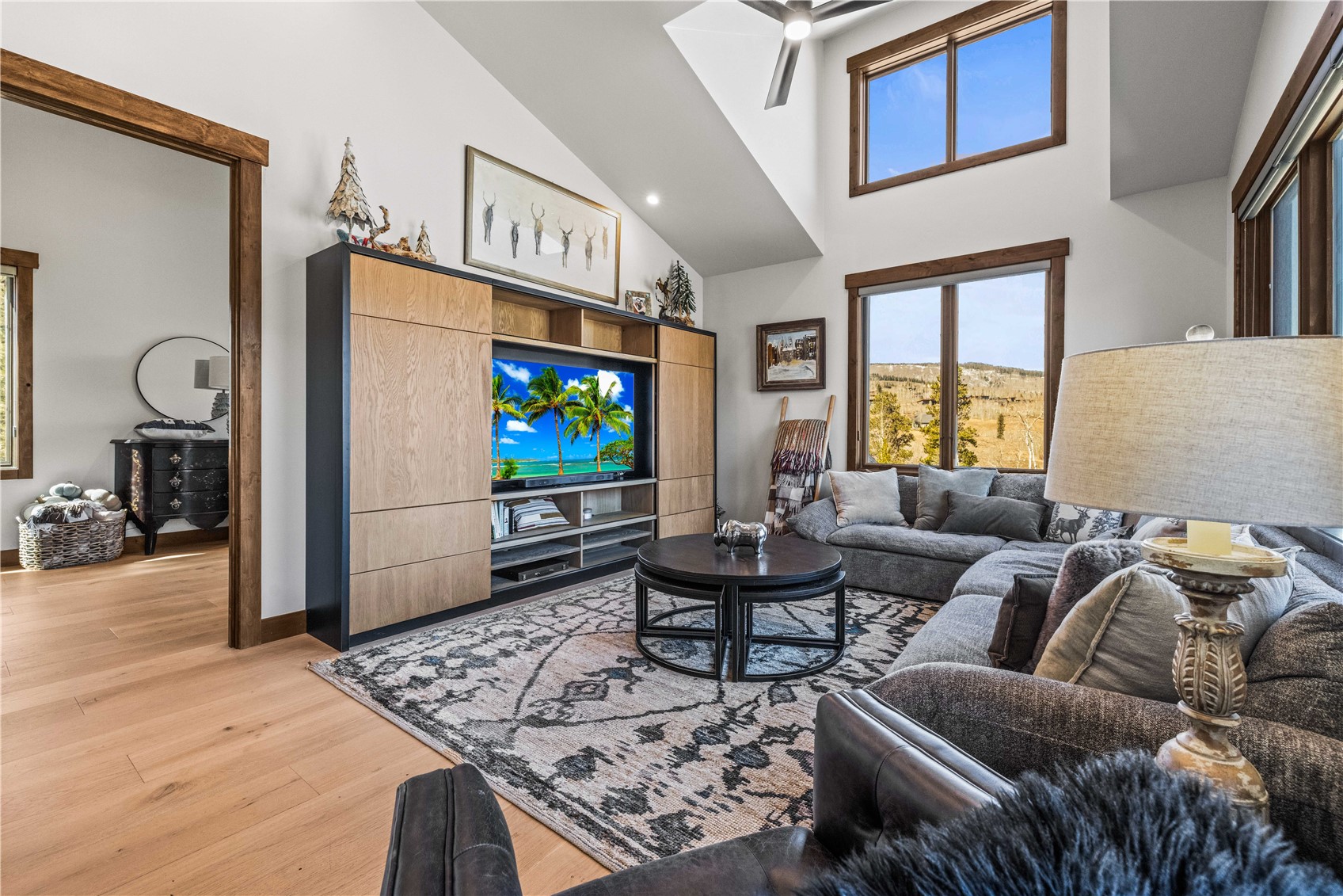 230 Game Trail Road Silverthorne, CO 80498 - Photo 19 of 43 a living room with furniture and a flat screen tv