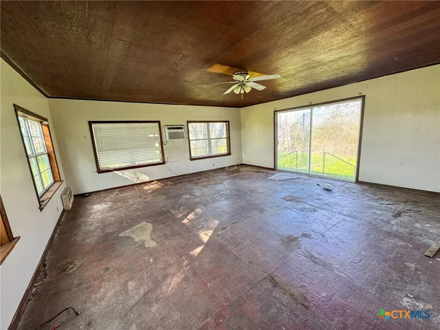 a view of a playground with basketball court