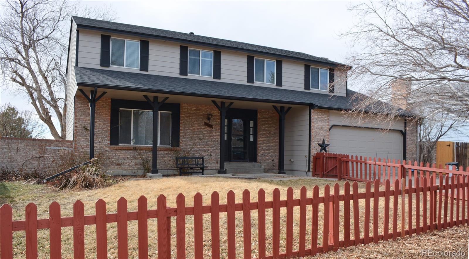 2087 South Quintero Street Aurora, CO 80013 - Photo 1 of 34 a front view of a house