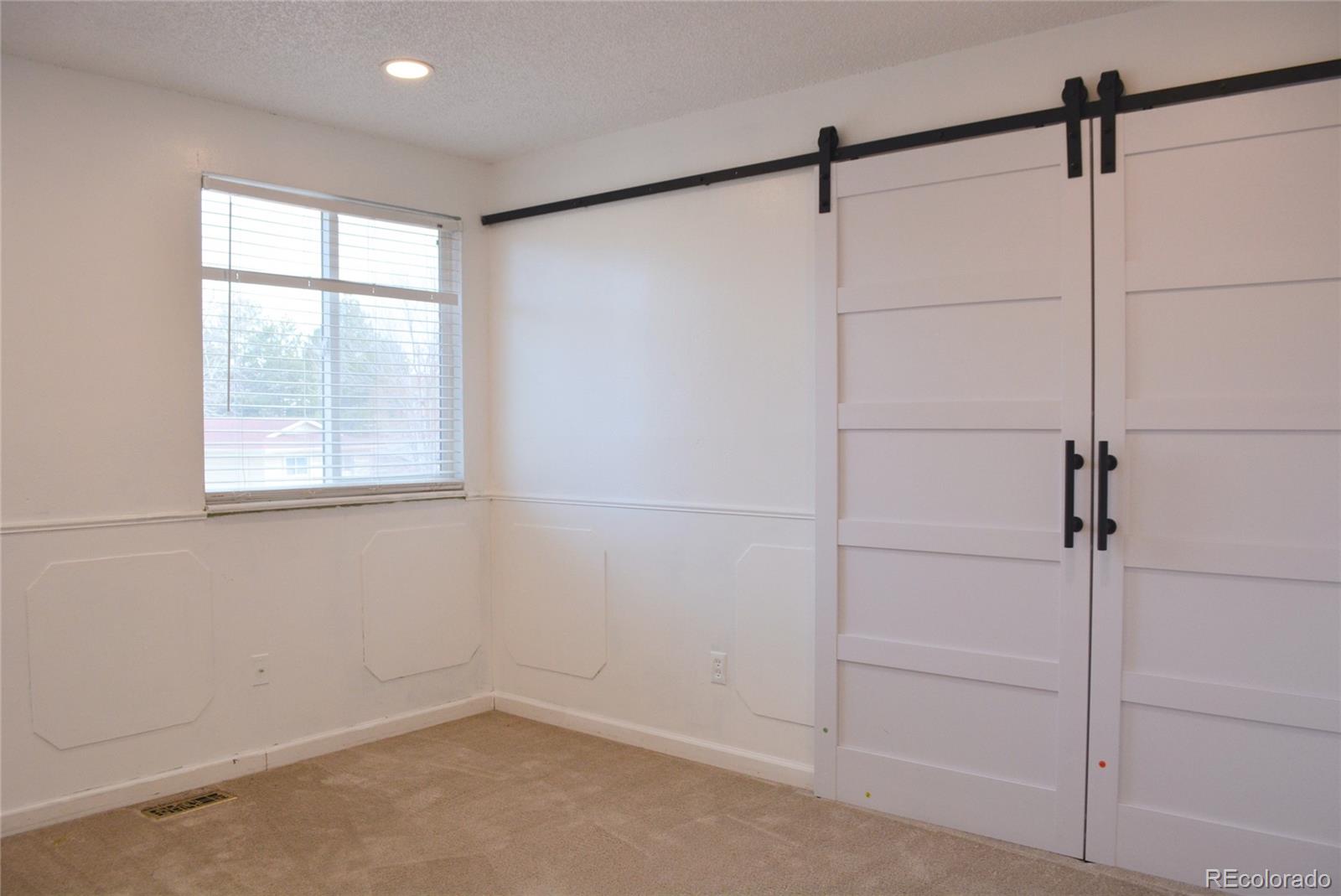 2087 South Quintero Street Aurora, CO 80013 - Photo 21 of 34 a view of a window in an empty room
