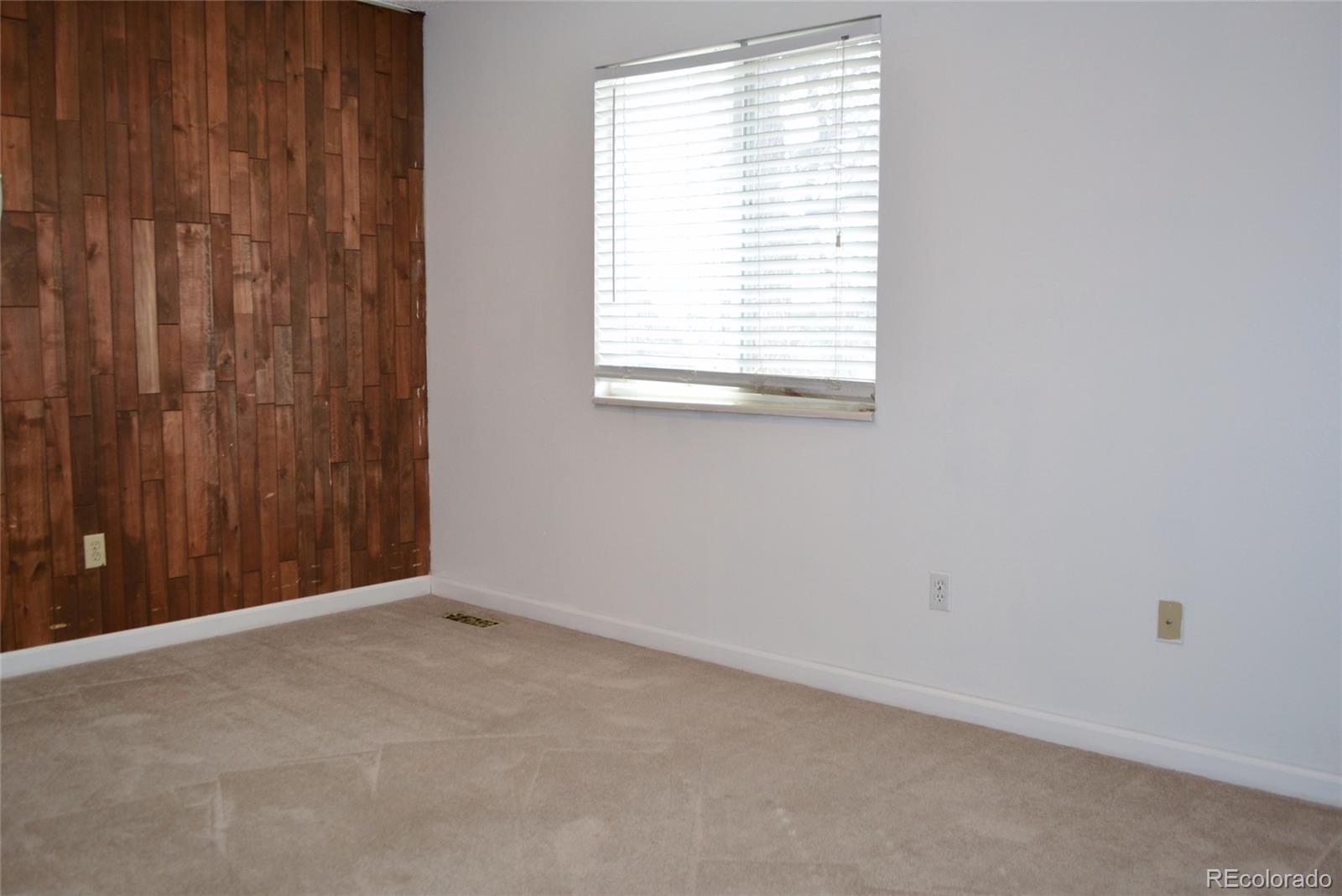 2087 South Quintero Street Aurora, CO 80013 - Photo 23 of 34 an empty room with a window