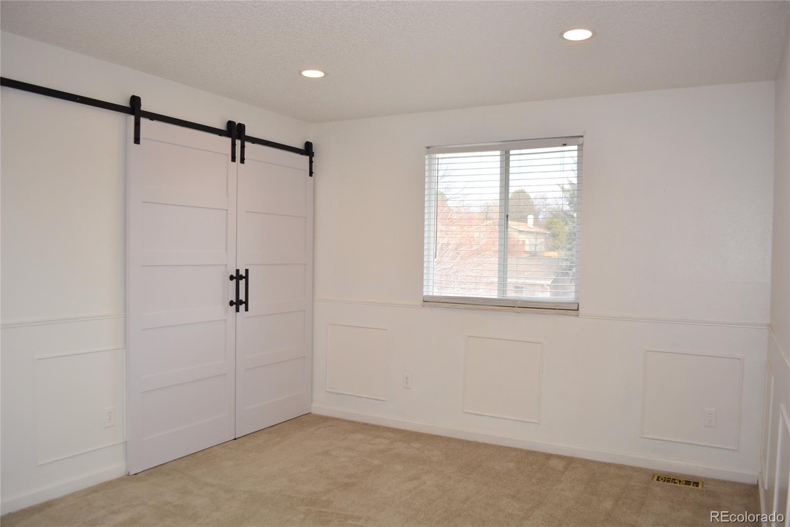 2087 South Quintero Street Aurora, CO 80013 - Photo 25 of 34 a view of an empty room
