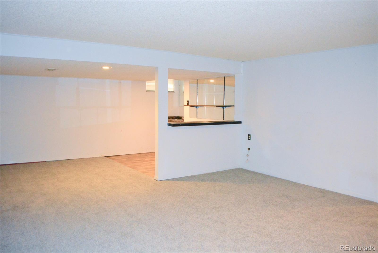 2087 South Quintero Street Aurora, CO 80013 - Photo 27 of 34 an empty room with a window