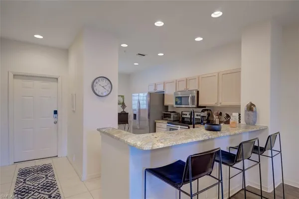 $6,700 | 8223 Parkstone Place, Unit 102, Naples, FL 34120