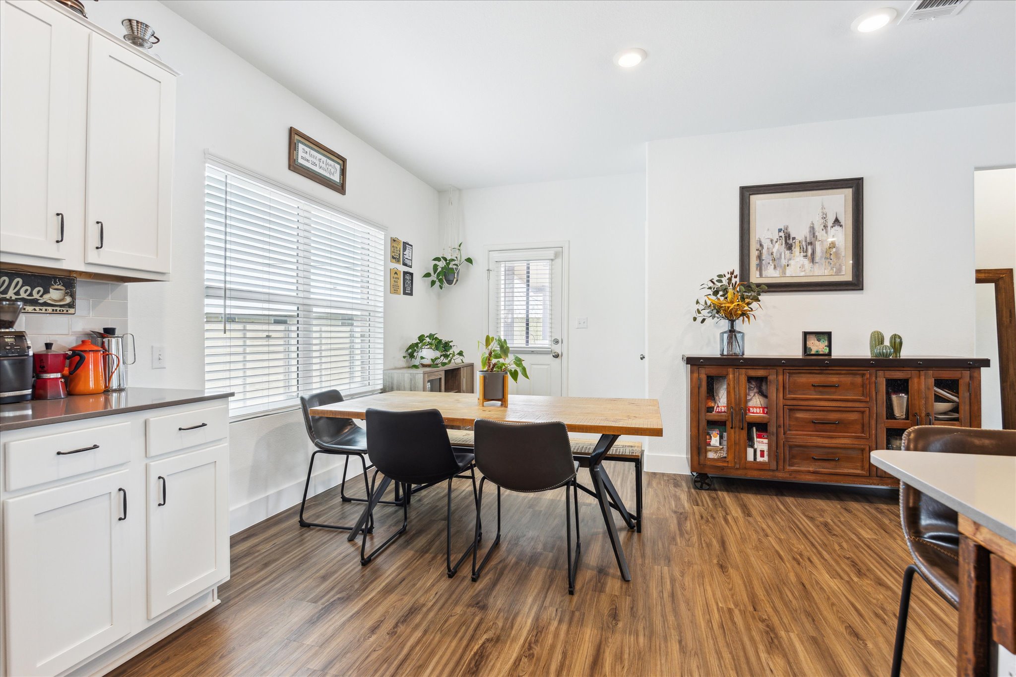 700 Legends Lane Georgetown, TX 78628 - Photo 8 of 31 Dining area with dark wood-style flooring, baseboards, and recessed lighting