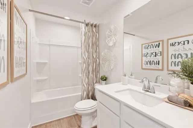 a kitchen with stainless steel appliances a refrigerator sink and microwave