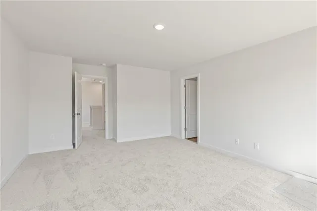 a bathroom with a double vanity sink and mirror