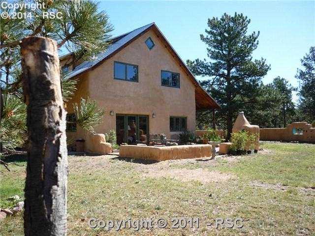 1101 Doe Valley Road Guffey, CO 80820 - Photo 2 of 16 House view in Summer