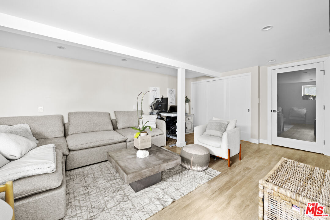 7520 Earldom Avenue Playa del Rey, CA 90293 - Photo 17 of 28 a living room with furniture and wooden floor