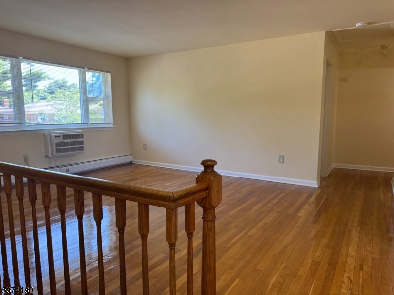 5 Traphagen Road, Unit A Wayne, NJ 07470 - Photo 17 of 18 a view of entryway with wooden floor