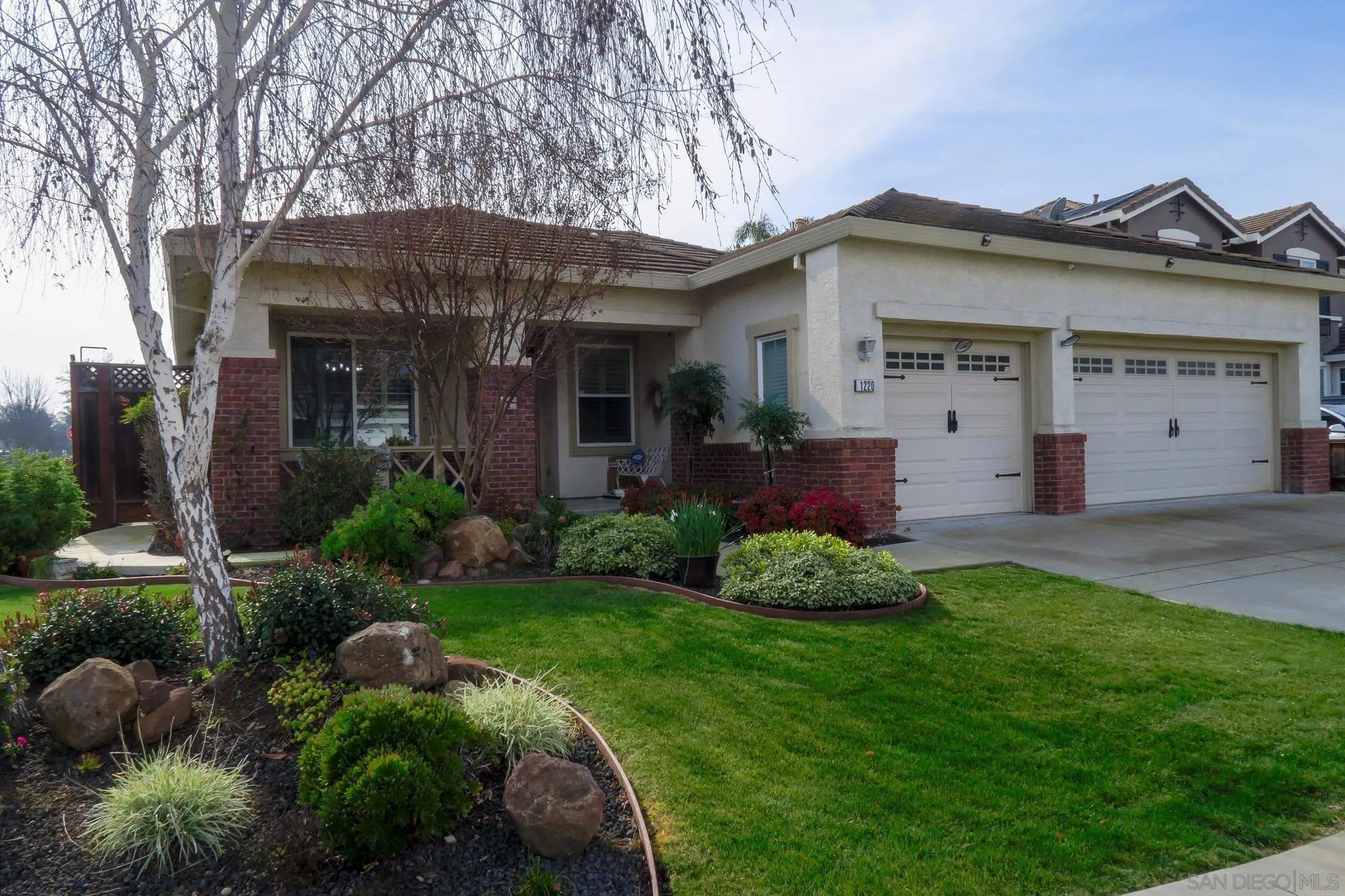 1220 Exeter Way Brentwood, CA 94513 - Photo 2 of 33 a front view of a house with garden