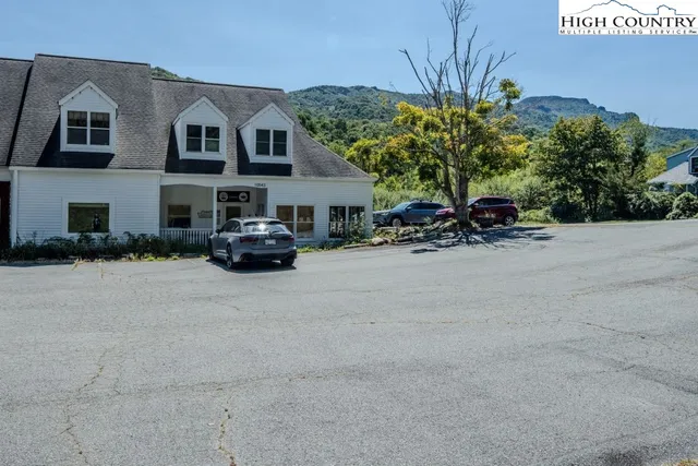 a car parked in front of a building