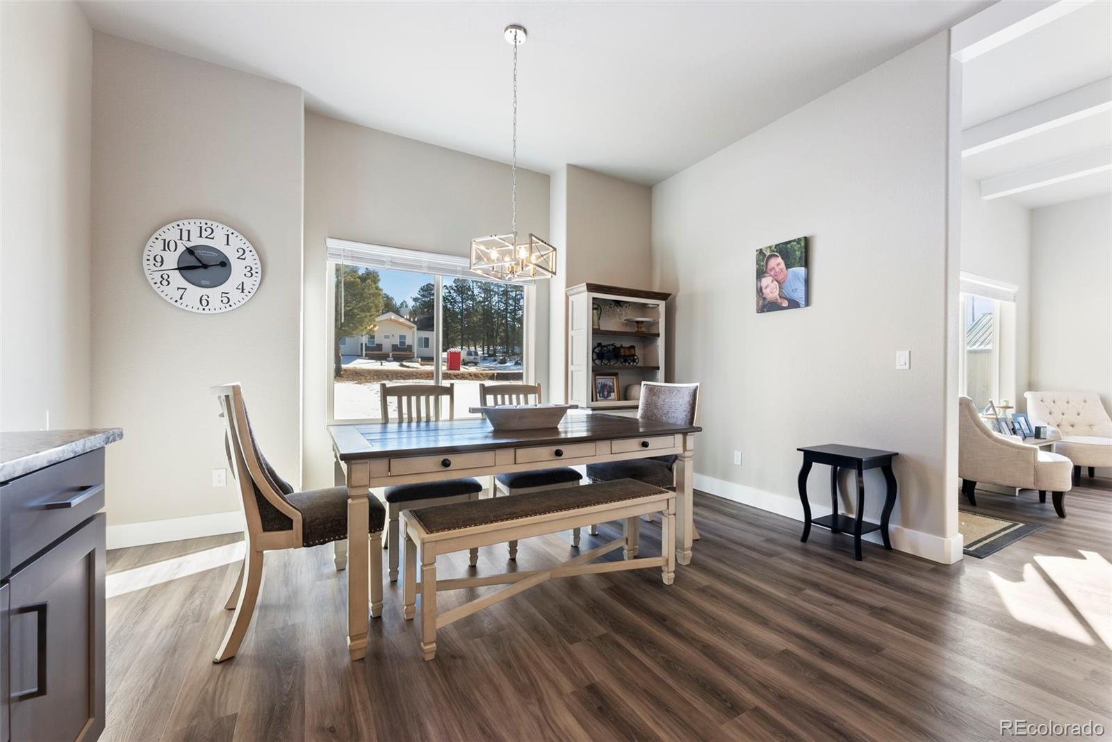 489 Duesouth Road Florissant, CO 80816 - Photo 11 of 40 a workspace with wooden floor