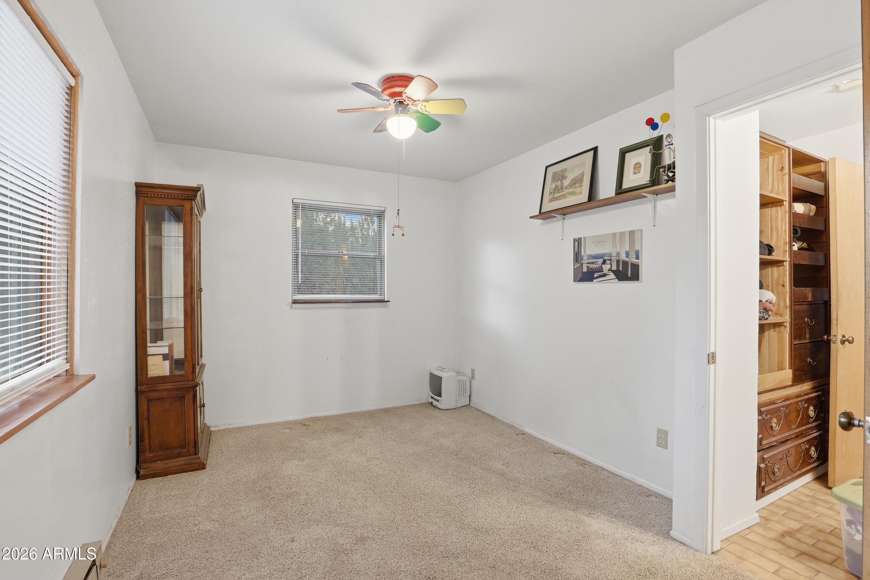 8135 West Gibson Ranch Road Payson, AZ 85541 - Photo 14 of 43 a view of livingroom with hardwood floor and ceiling fan