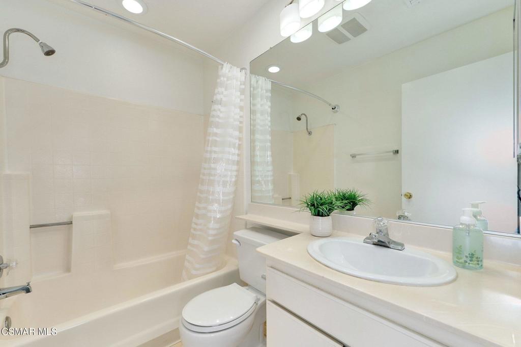 5368 Rainwood Street, Unit 65 Simi Valley, CA 93063 - Photo 26 of 34 a bathroom with a sink a toilet and shower