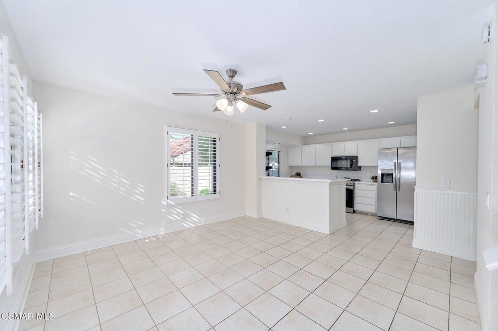 5368 Rainwood Street, Unit 65 Simi Valley, CA 93063 - Photo 8 of 34 a view of kitchen with furniture and window