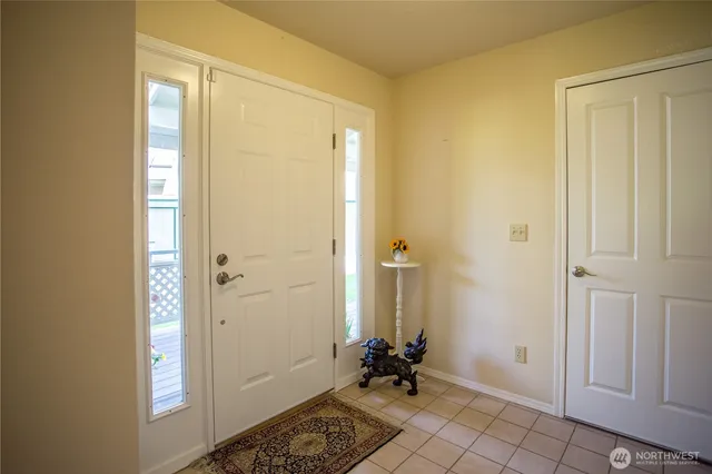 a bathroom with a sink a mirror and shower