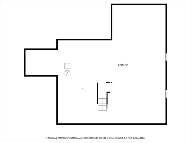 a black and white photo of a hallway