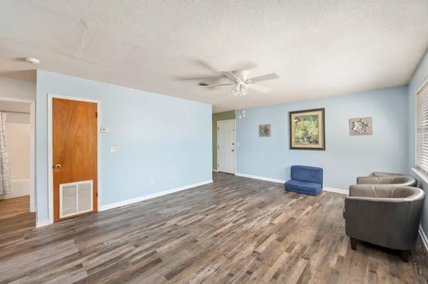 a room with furniture and a window