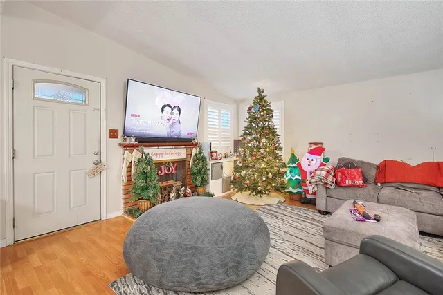 a living room with furniture and a table