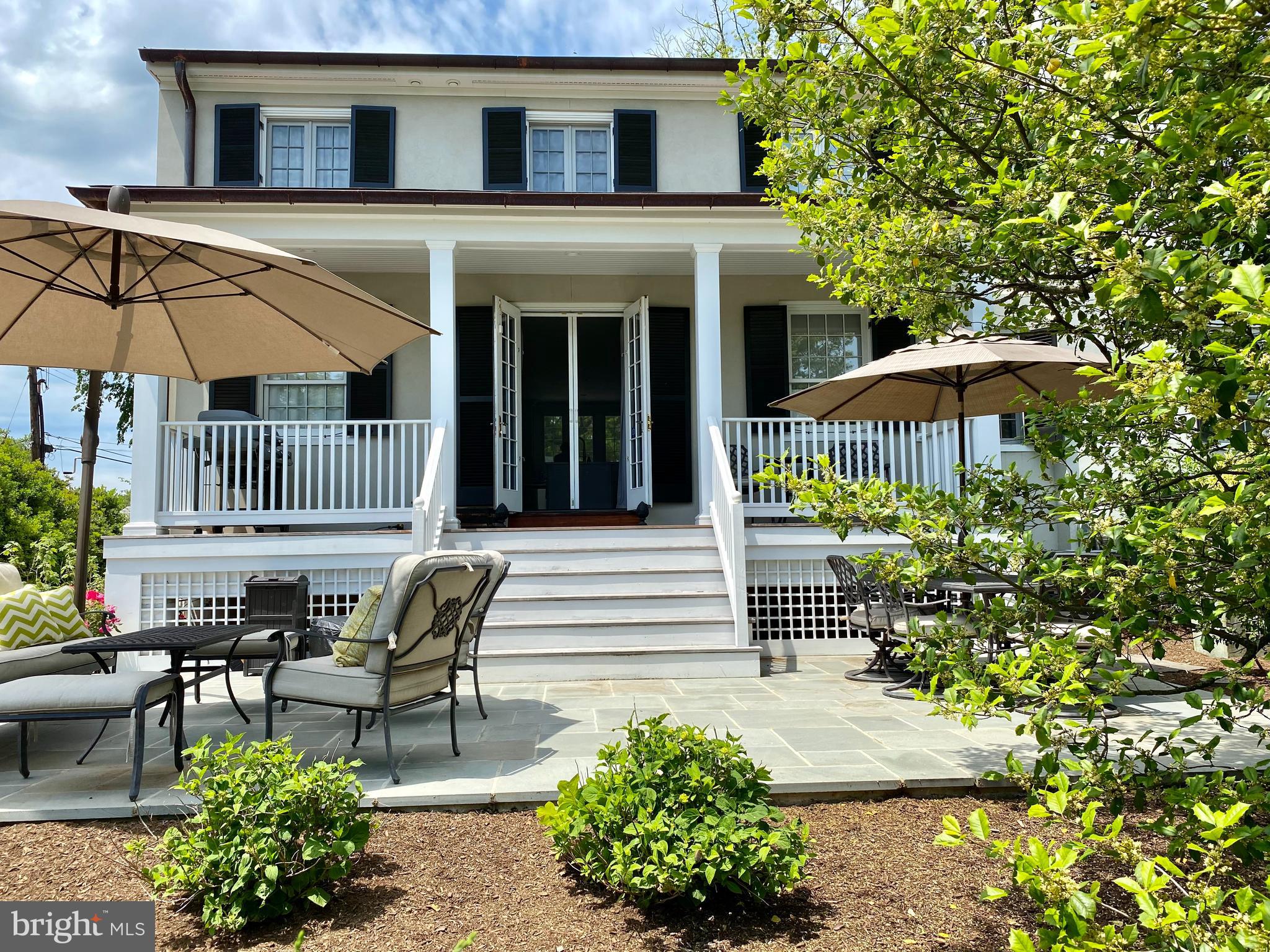121 Upnor Road Baltimore, MD 21212 - Photo 12 of 79 a front view of a house with garden and porch