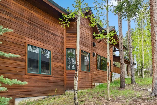 a view of a house with brick walls and windows