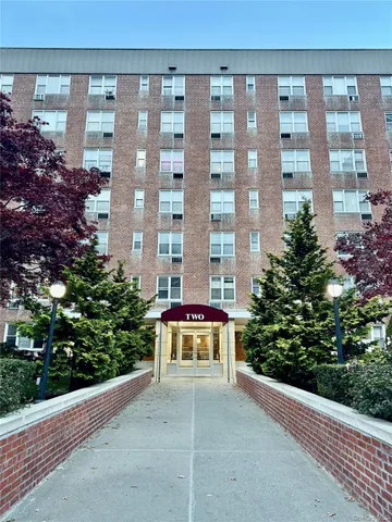 a building with a garden in front of it