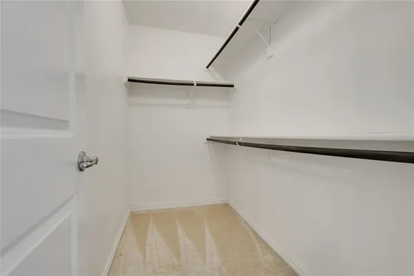 a view of small space with racks on the wall