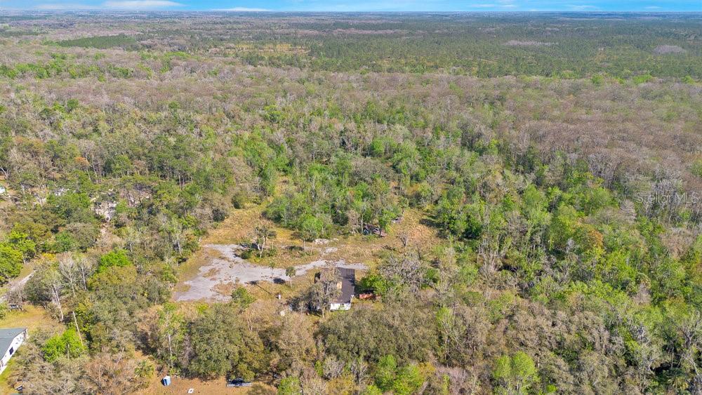 953 Baron Road Orlando, FL 32828 - Photo 13 of 15 a view of a field with an ocean view
