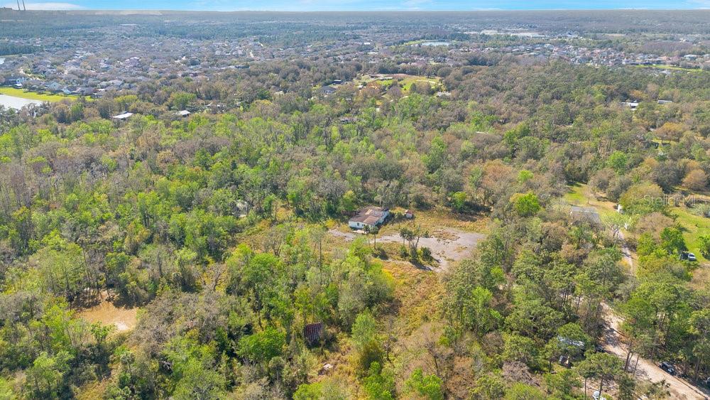 953 Baron Road Orlando, FL 32828 - Photo 8 of 15 an aerial view of residential house with parking space