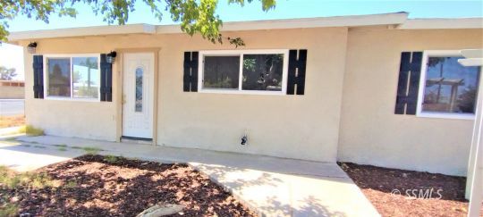 137 South Sunland Street Ridgecrest, CA 93555 - Photo 3 of 18 a front view of a house