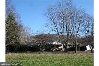 394 Morgan Ford Road Front Royal, VA 22630 - Photo 1 of 10 a view of house with a yard
