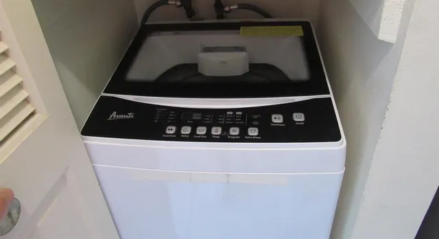 a view of a building with a car parked front of it