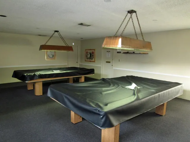 a view of a building with a swimming pool