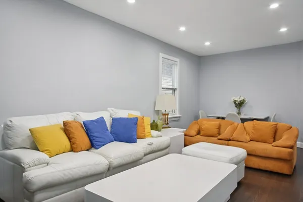 a living room with furniture and a couch