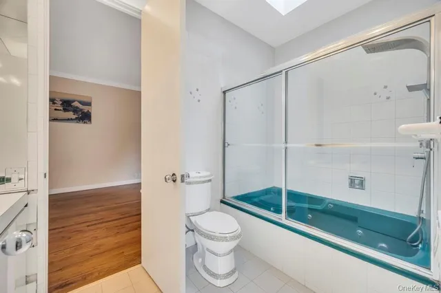 a bathroom with a sink a light fixture and a light fixture