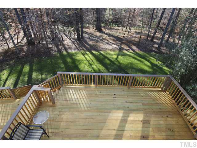 12100 Betts Lane Raleigh, NC 27614 - Photo 13 of 17 Large back deck is the ideal place for entertaining and enjoying the outdoors. The backyard is extremely private! Patio/Deck