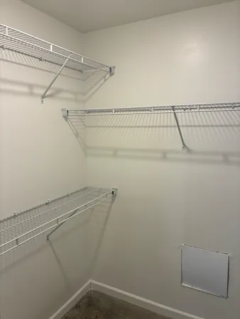 a view of a room with racks on the wall