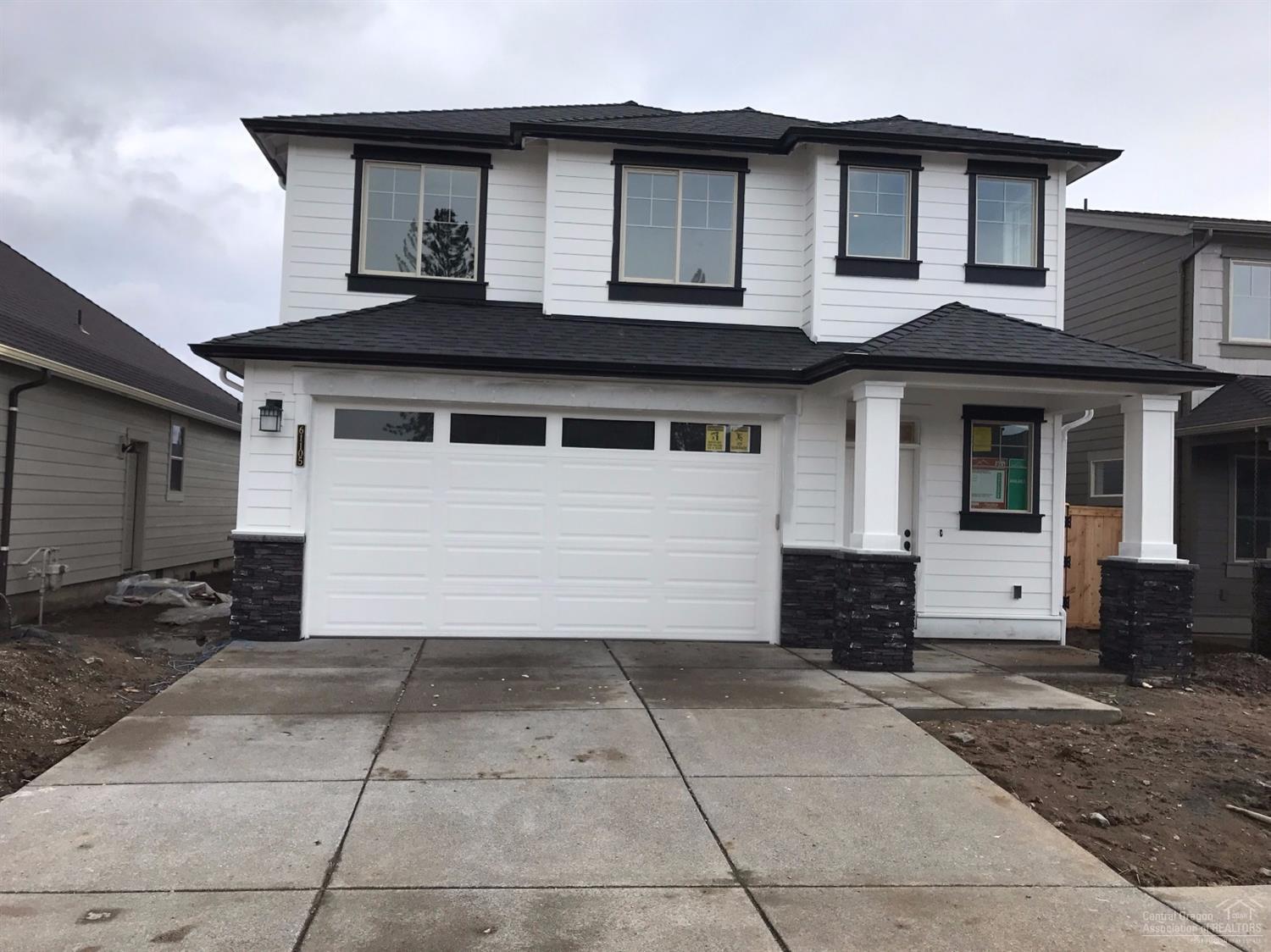 61105 Southeast Stari Most Loop Bend, OR 97702 - Photo 1 of 15 Photo of actual home. Exterior painting