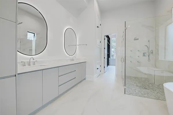 a white bath tub sitting in a bathroom