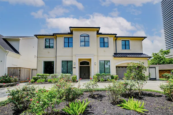 a front view of house with a yard