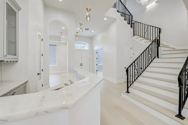a kitchen with a stove and a sink