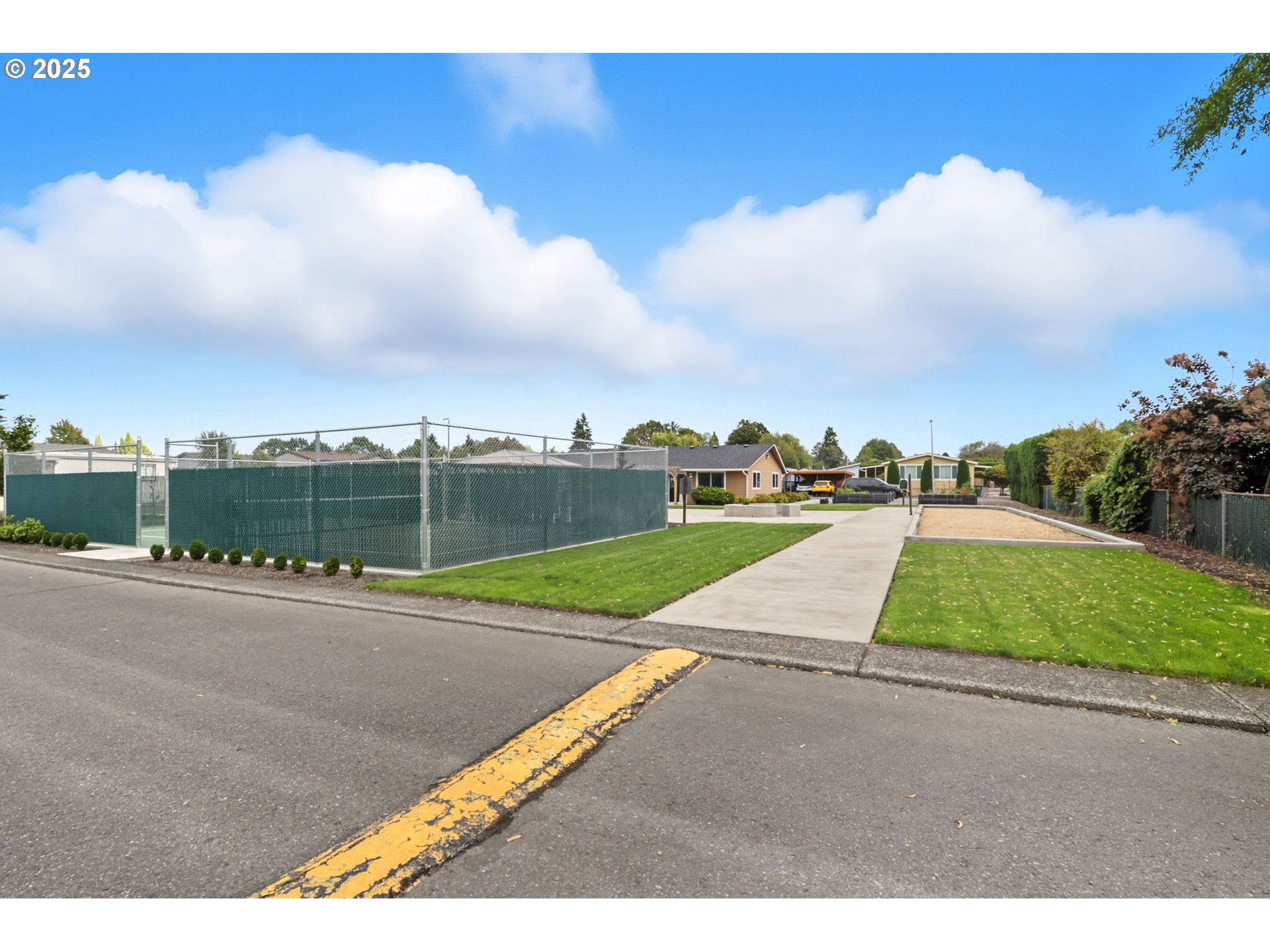 300 Southwest 7th Avenue, Unit 95 Battle Ground, WA 98604 - Photo 20 of 27 a view of a road with a building in the background