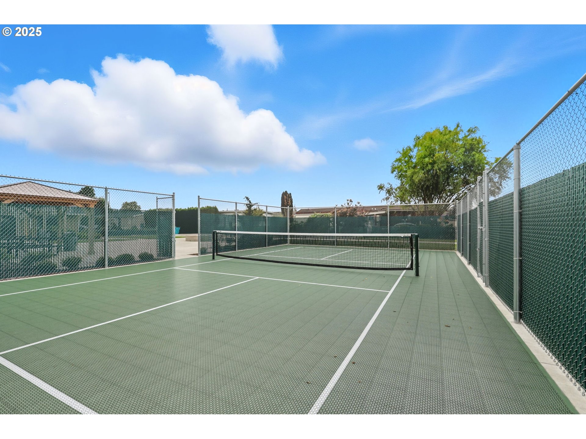 300 Southwest 7th Avenue, Unit 95 Battle Ground, WA 98604 - Photo 23 of 27 a view of a tennis court