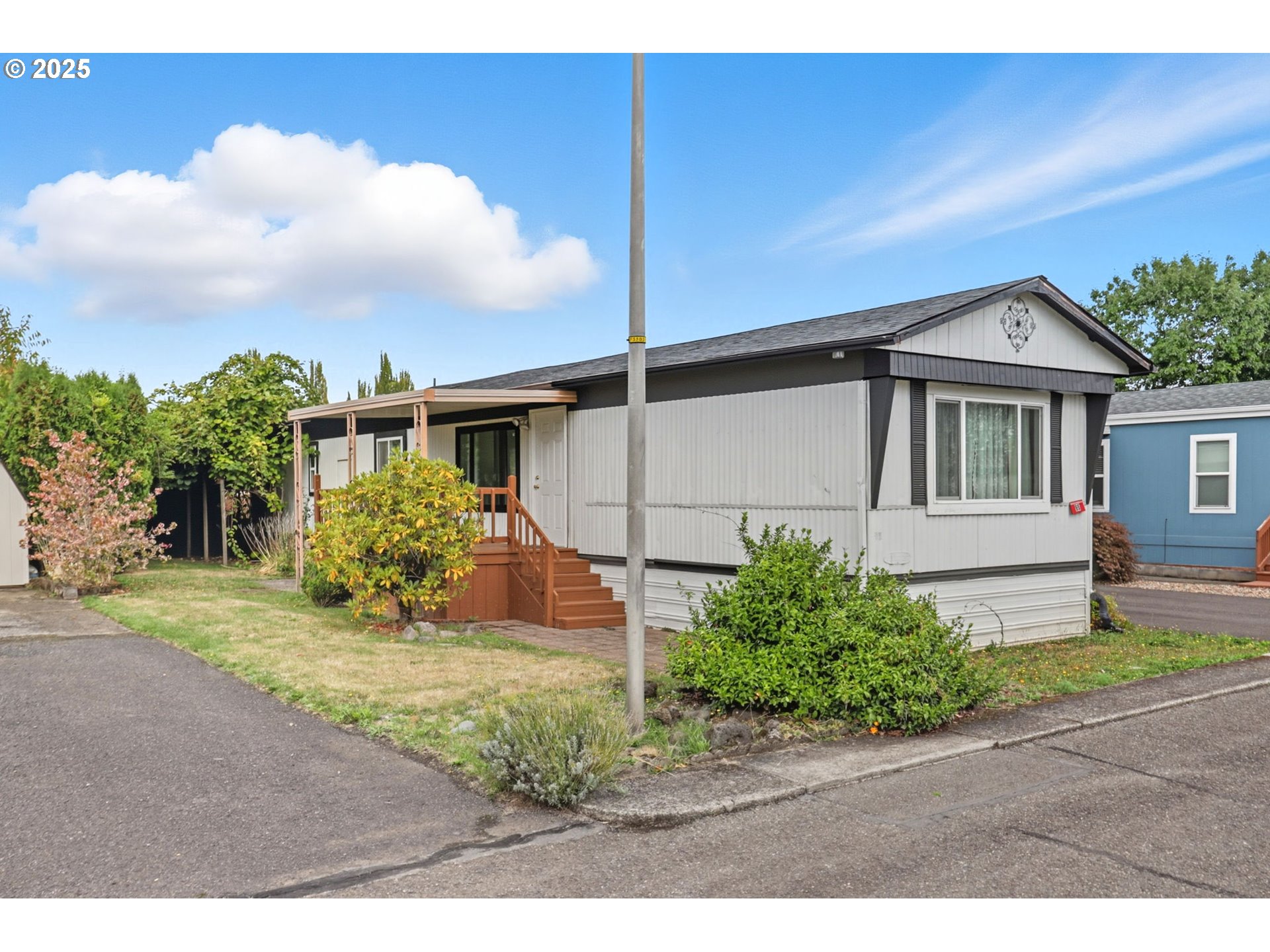 300 Southwest 7th Avenue, Unit 95 Battle Ground, WA 98604 - Photo 26 of 27 a house view with a backyard space