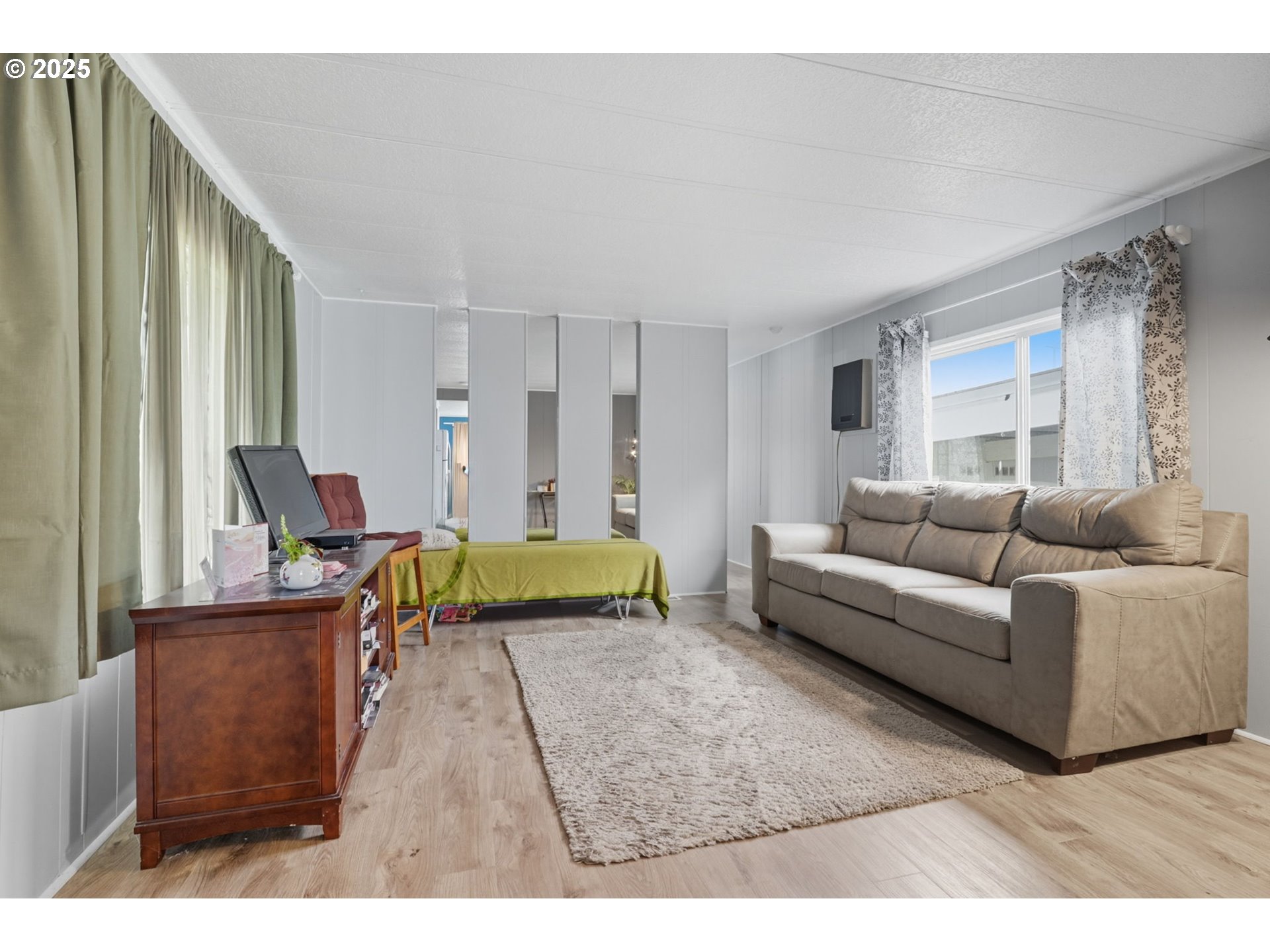 300 Southwest 7th Avenue, Unit 95 Battle Ground, WA 98604 - Photo 6 of 27 a living room with furniture and a couch