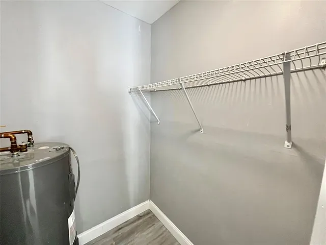 a view of a room with racks on the wall