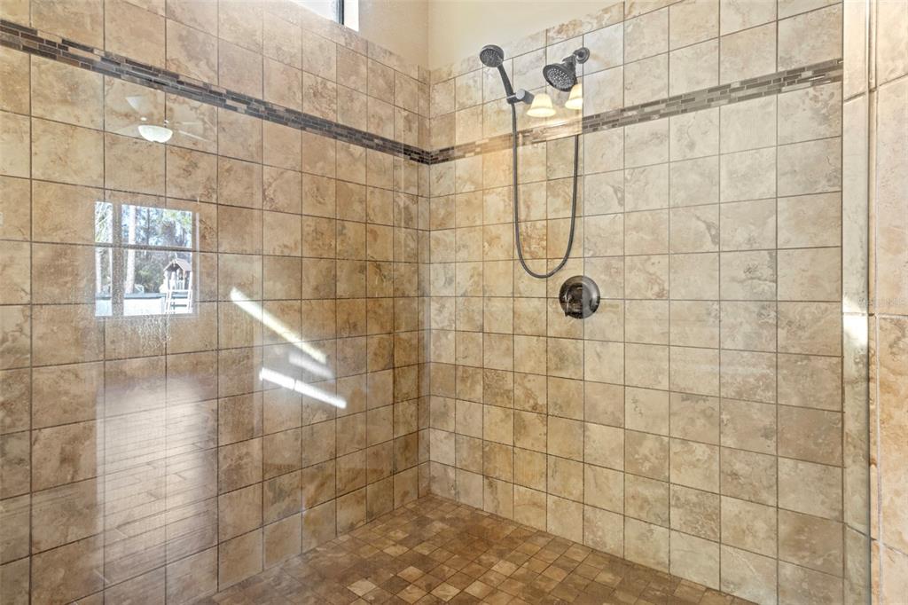 765 Sloans Ridge Road Groveland, FL 34736 - Photo 22 of 62 a bathroom with a shower