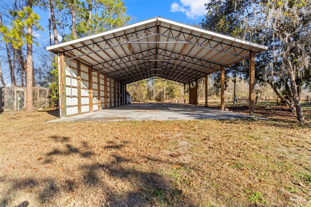 765 Sloans Ridge Road Groveland, FL 34736 - Photo 40 of 62 a view of a porch with a backyard